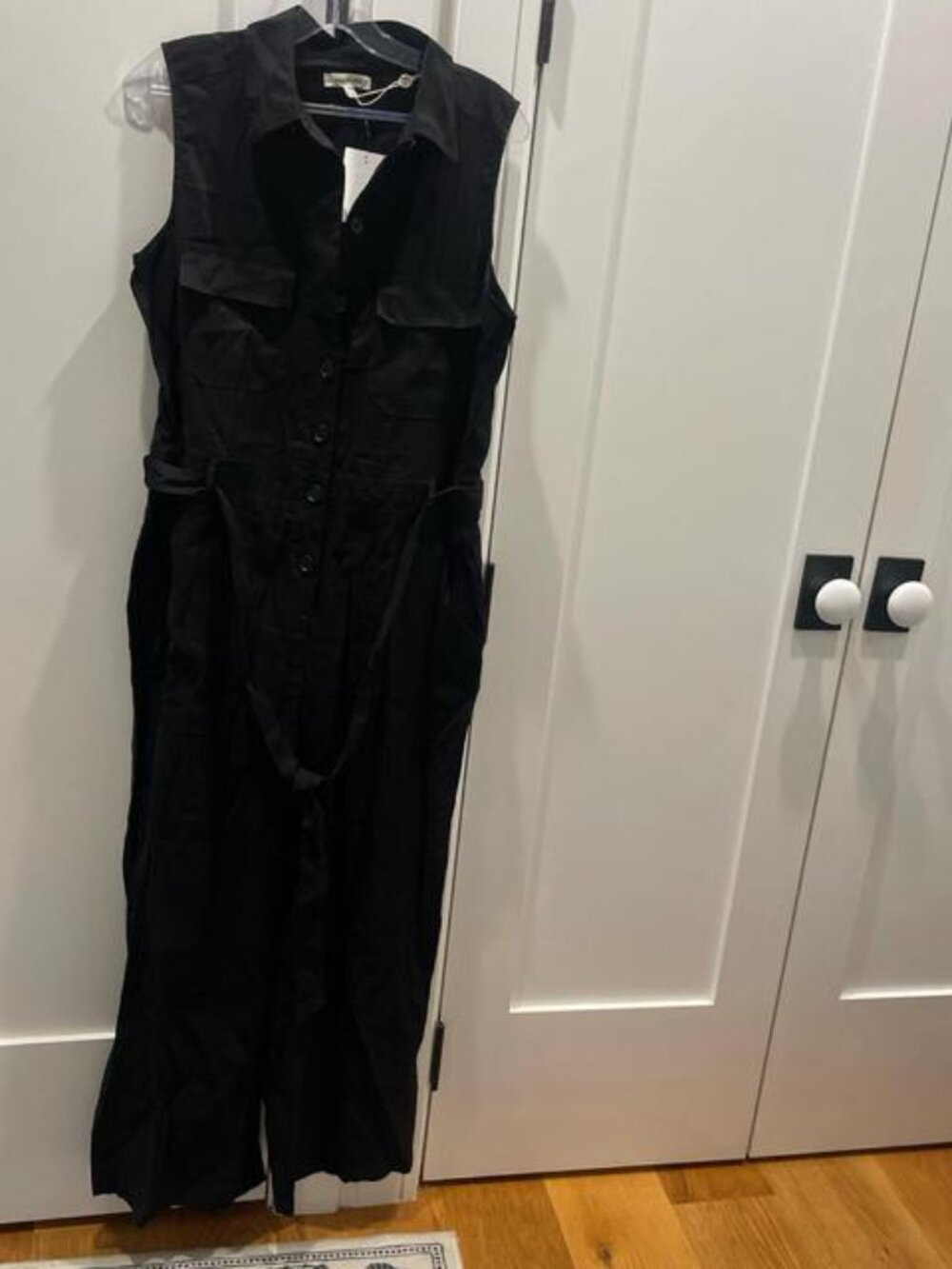 Black jumpsuit with belt, sleeveless with collar